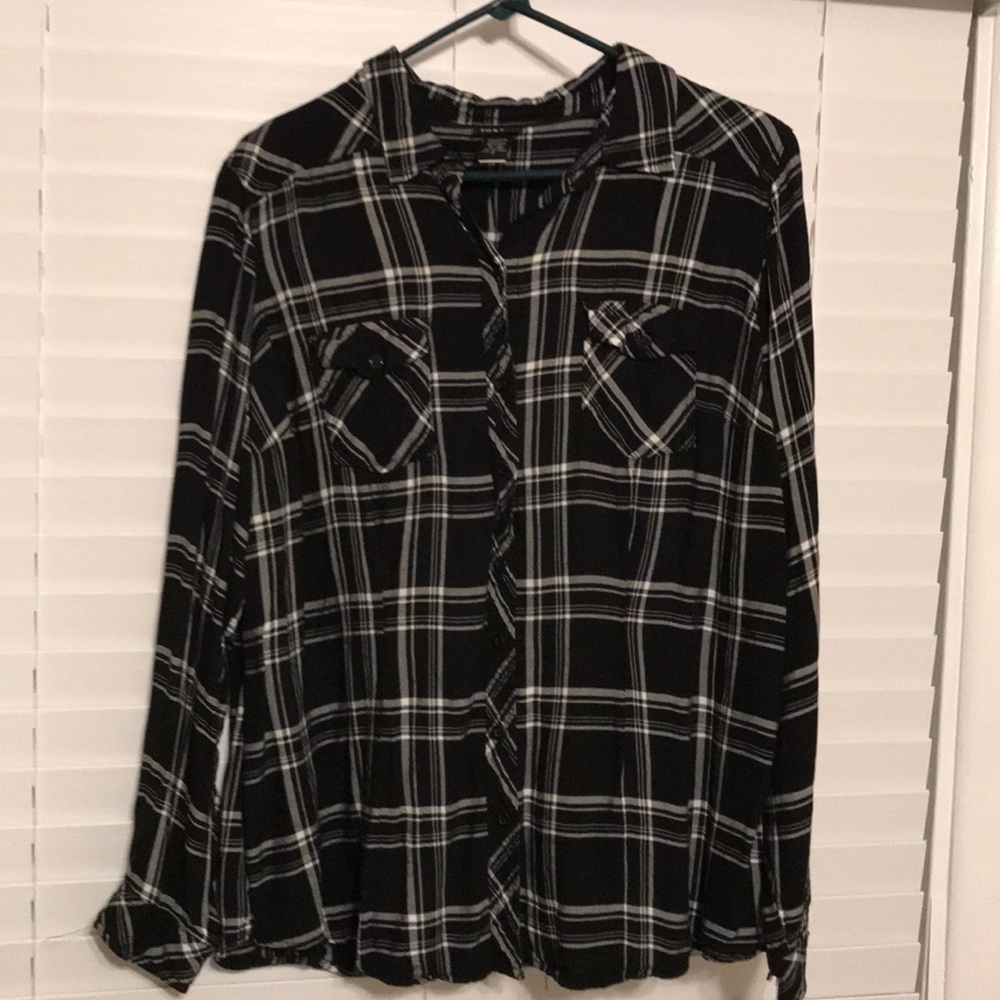 Cute black and white plaid shirt.